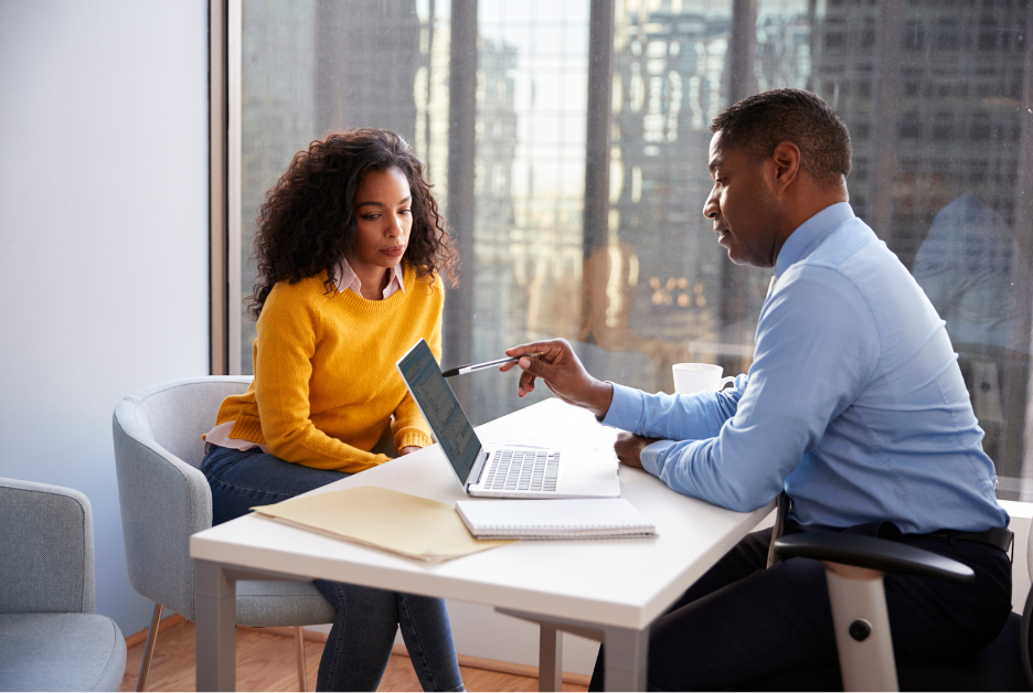 After the post-decree of divorce is issued a woman is meeting with her financial advisor.